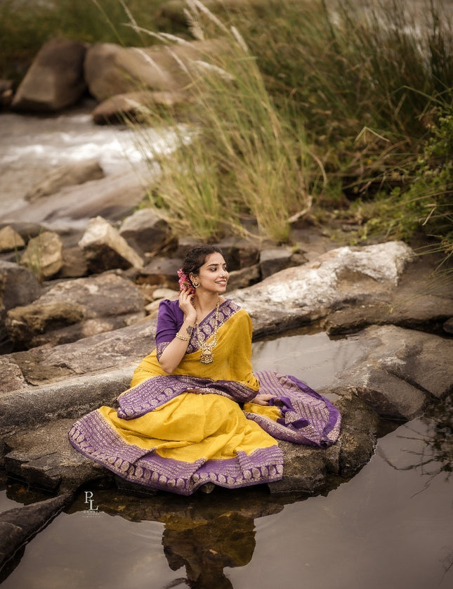 Abhisaarike Light yellow n purple soft semi Tussar saree