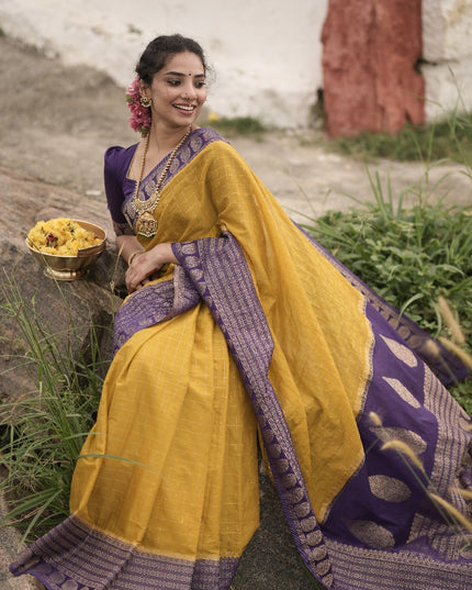 Abhisaarike Light yellow n purple soft semi Tussar saree