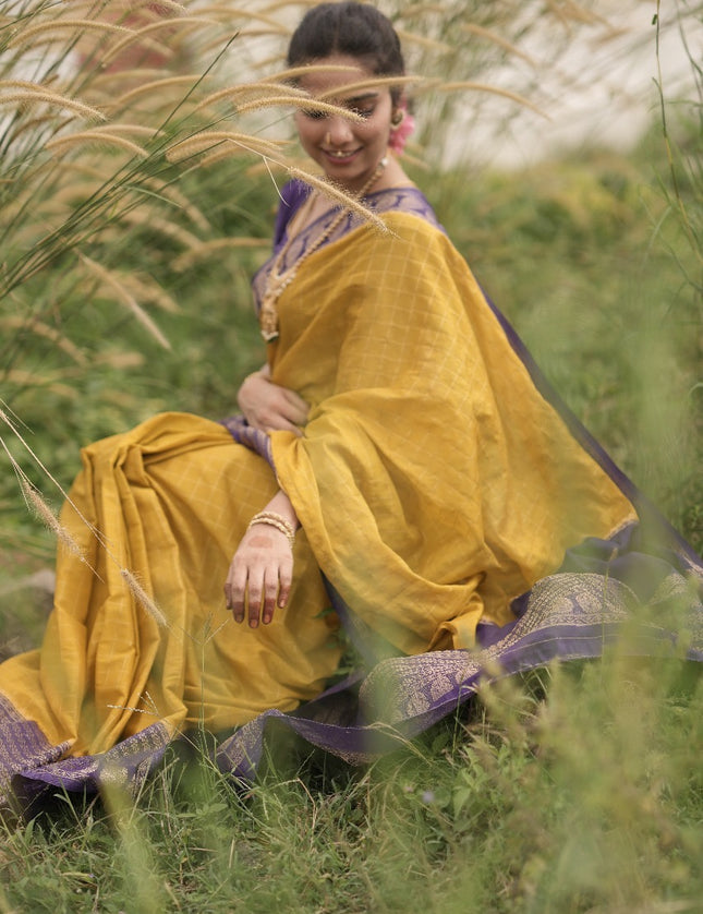 Abhisaarike Light yellow n purple soft semi Tussar saree