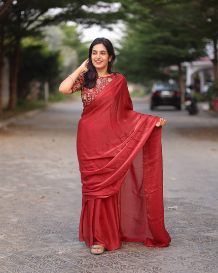 Shiny red party wear with heavy work blouse saree