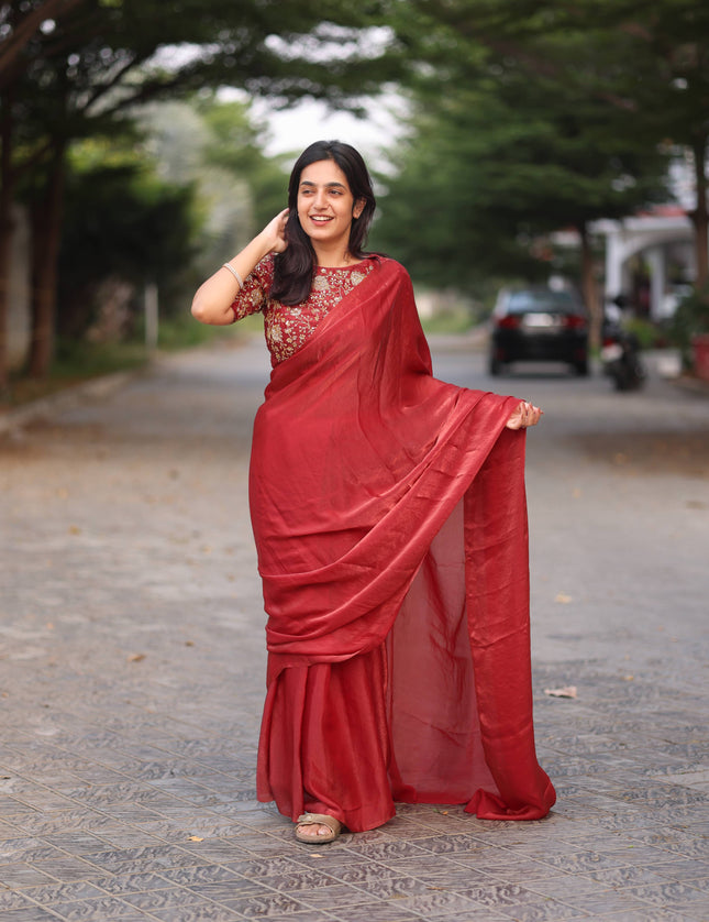 Shiny red party wear with heavy work blouse saree