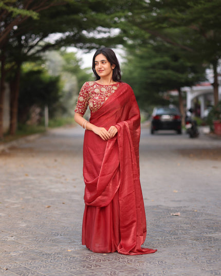 Shiny red party wear with heavy work blouse saree