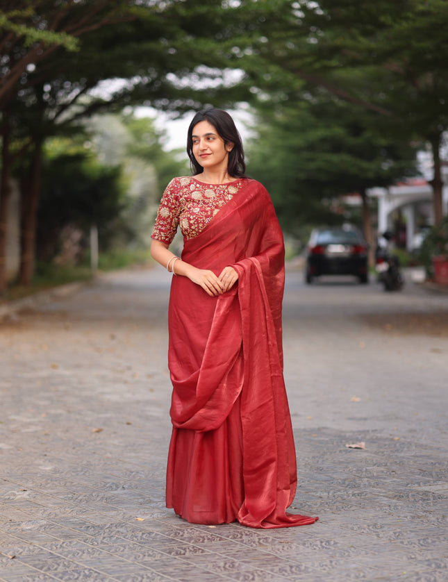 Shiny red party wear with heavy work blouse saree