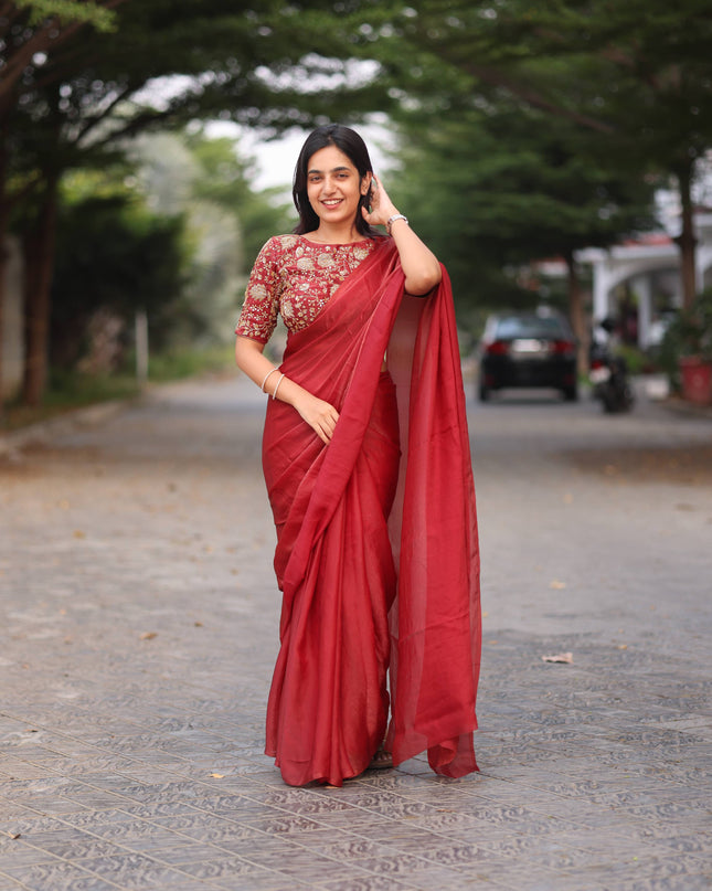 Shiny red party wear with heavy work blouse saree