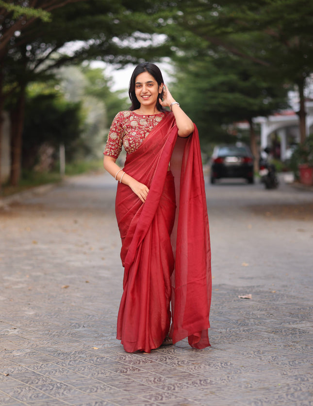 Shiny red party wear with heavy work blouse saree