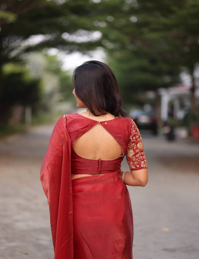 Shiny red party wear with heavy work blouse saree