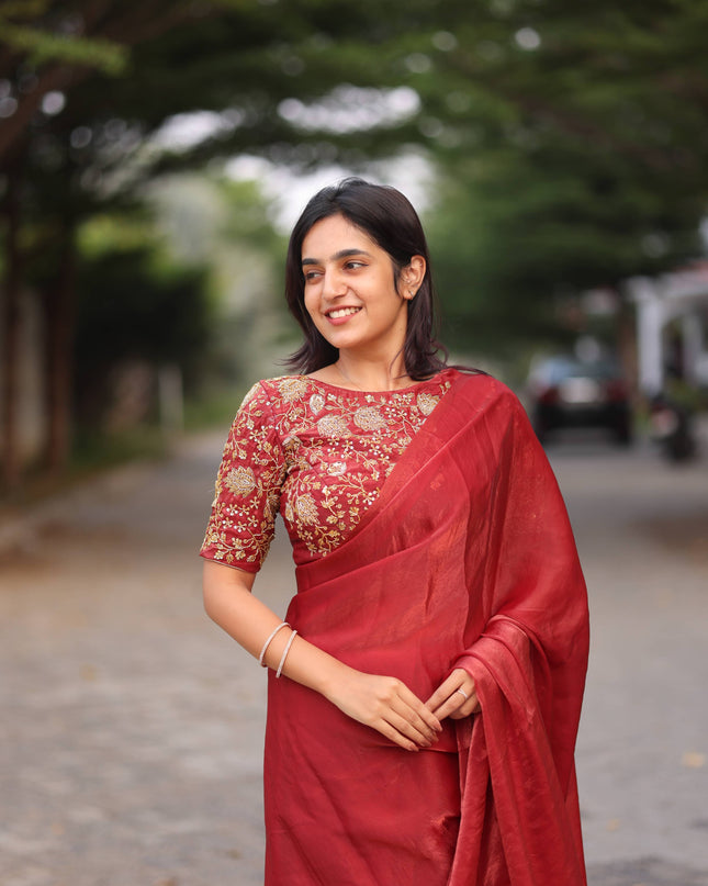 Shiny red party wear with heavy work blouse saree