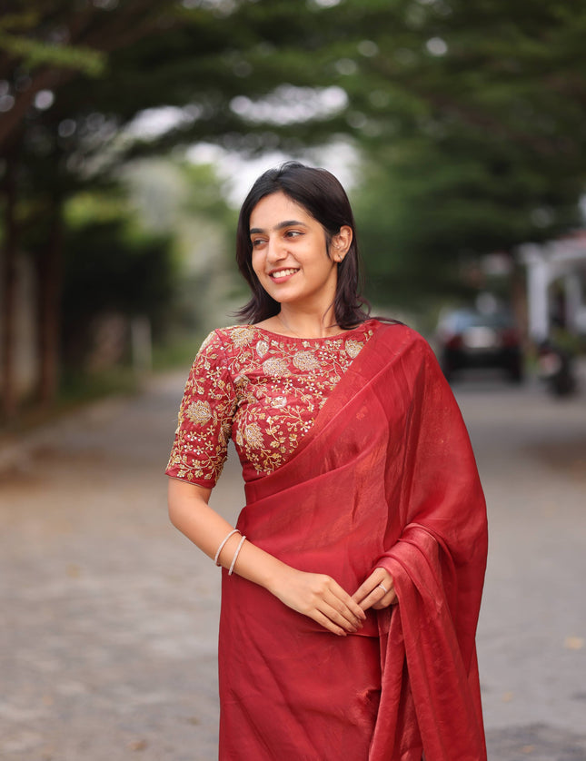 Shiny red party wear with heavy work blouse saree