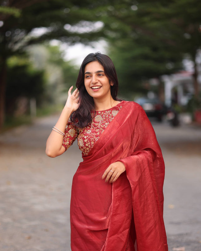 Shiny red party wear with heavy work blouse saree