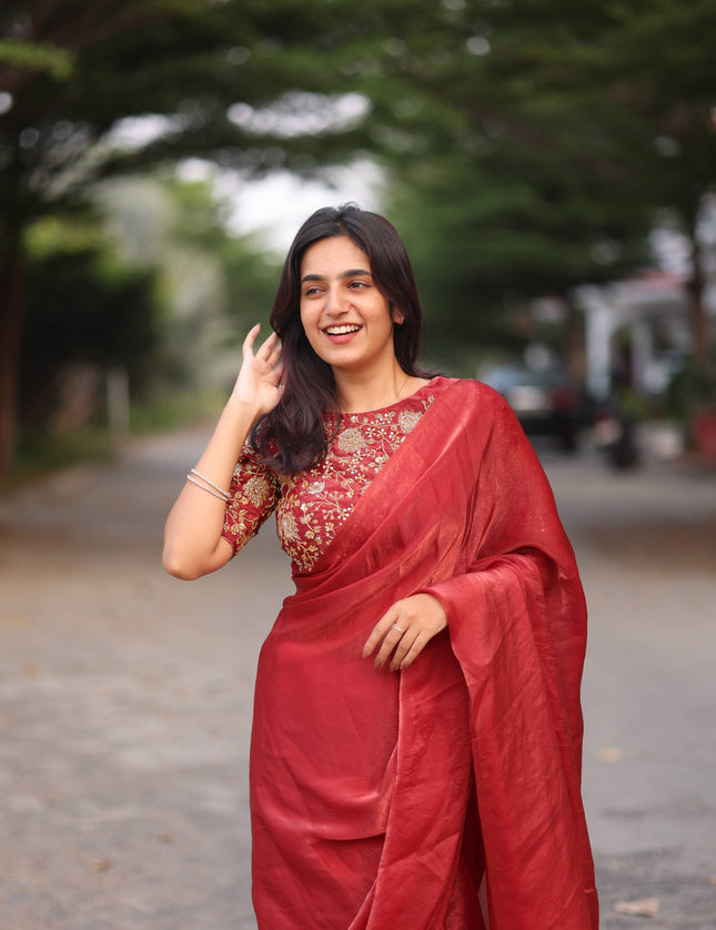 Shiny red party wear with heavy work blouse saree