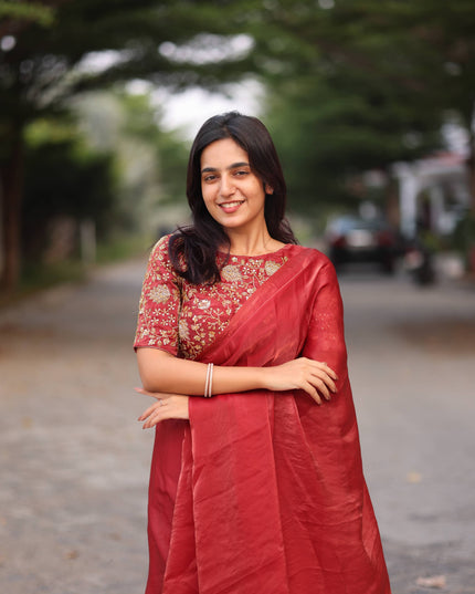 Shiny red party wear with heavy work blouse saree