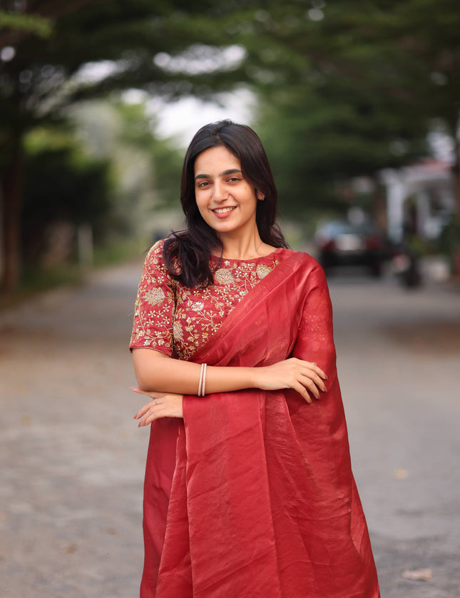 Shiny red party wear with heavy work blouse saree