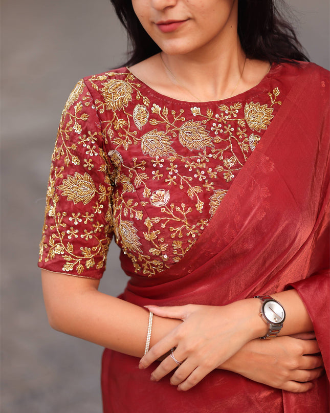 Shiny red party wear with heavy work blouse saree