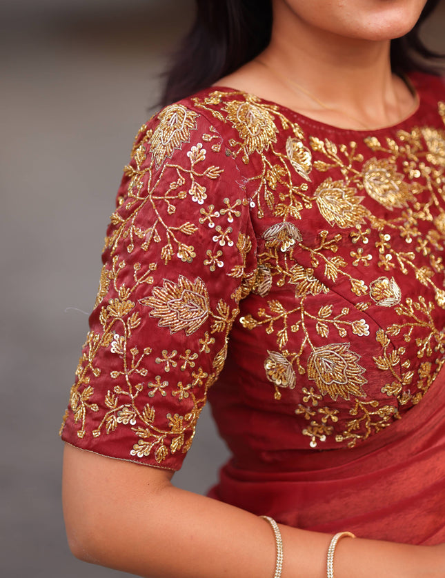 Shiny red party wear with heavy work blouse saree