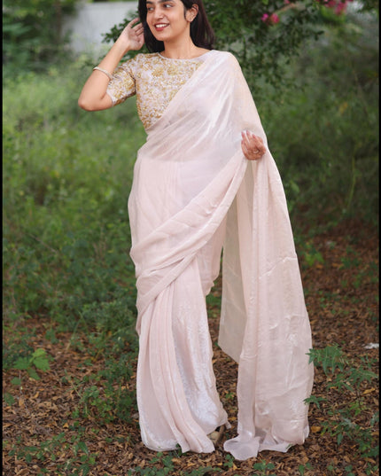 Shiny white party wear with heavy work blouse saree