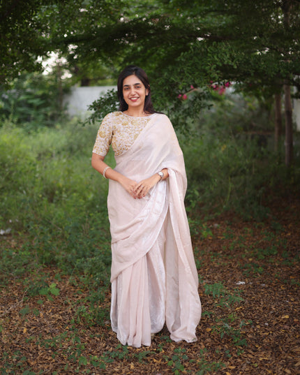 Shiny white party wear with heavy work blouse saree