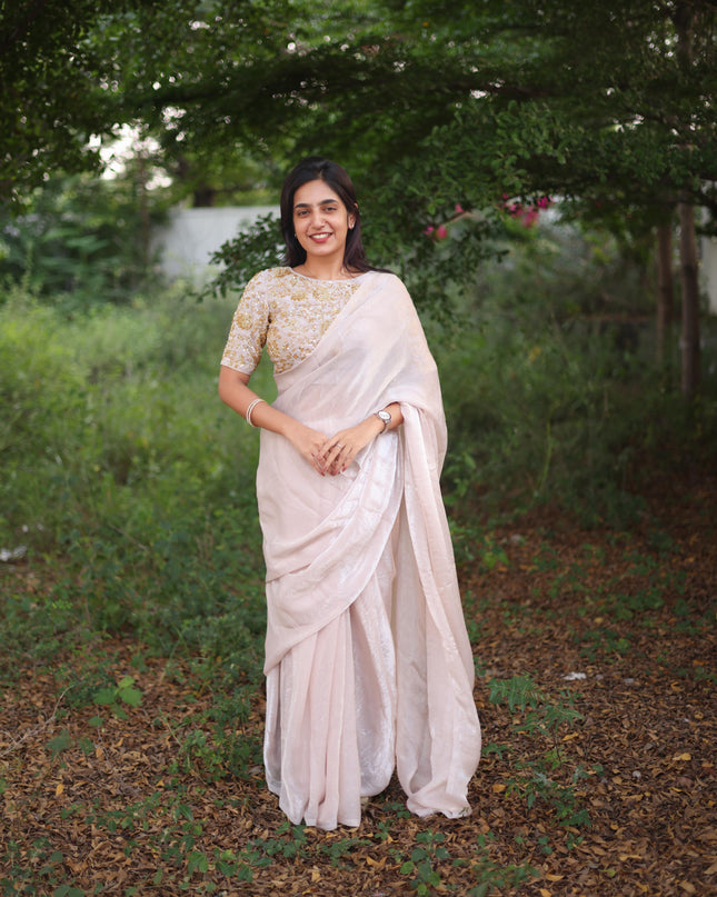 Shiny white party wear with heavy work blouse saree