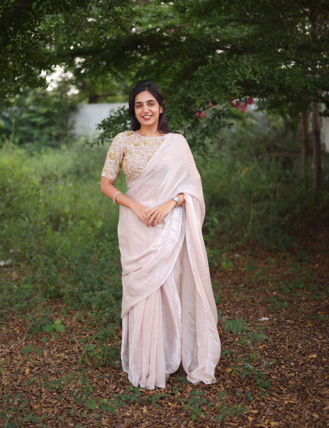 Shiny white party wear with heavy work blouse saree