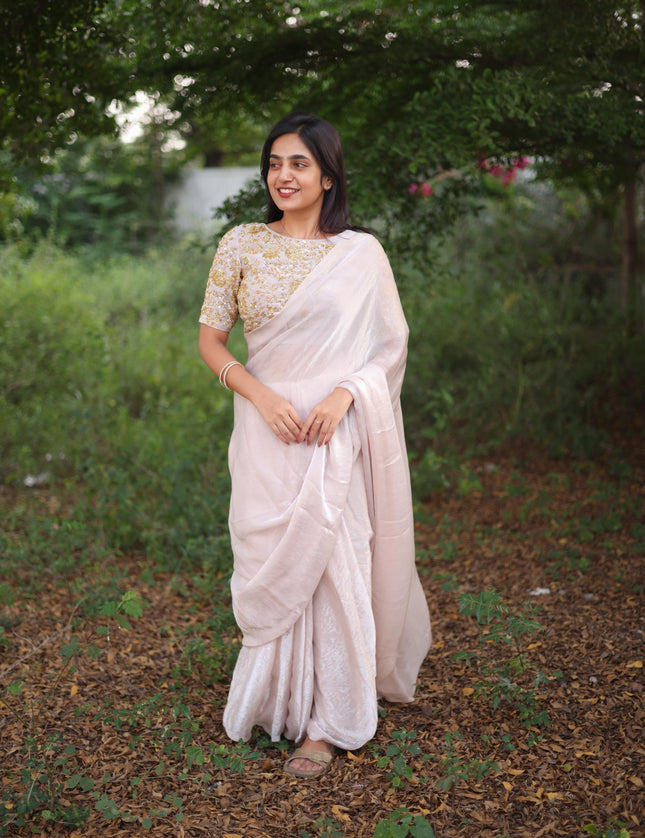 Shiny white party wear with heavy work blouse saree