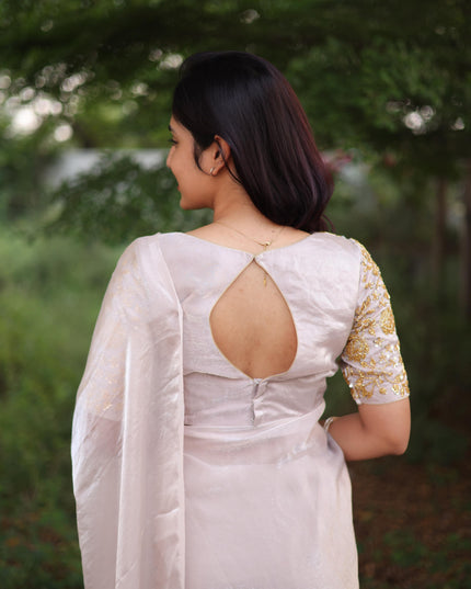 Shiny white party wear with heavy work blouse saree