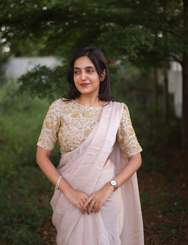 Shiny white party wear with heavy work blouse saree