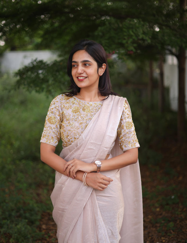 Shiny white party wear with heavy work blouse saree