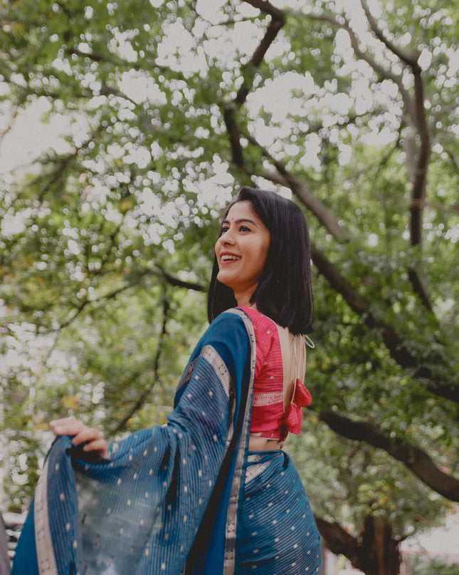 Suchira Peacock blue stripes bentex with contrast blouse saree