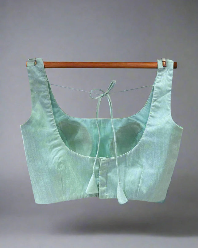 Sea green semi raw silk sleeveless blouse