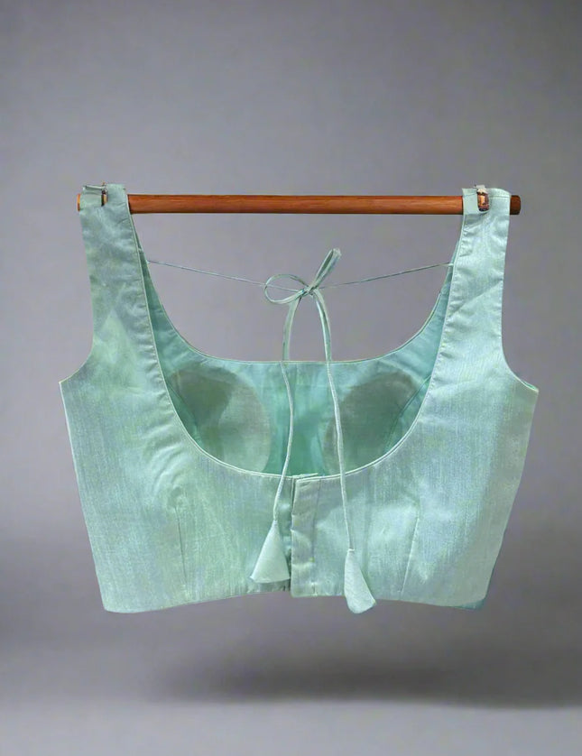 Sea green semi raw silk sleeveless blouse