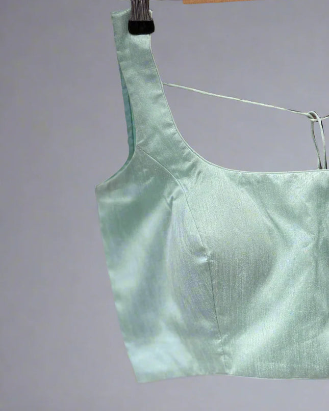 Sea green semi raw silk sleeveless blouse