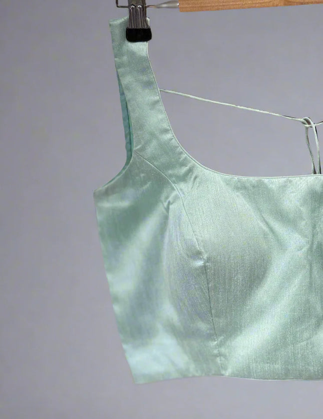 Sea green semi raw silk sleeveless blouse