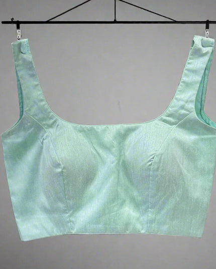 Sea green semi raw silk sleeveless blouse