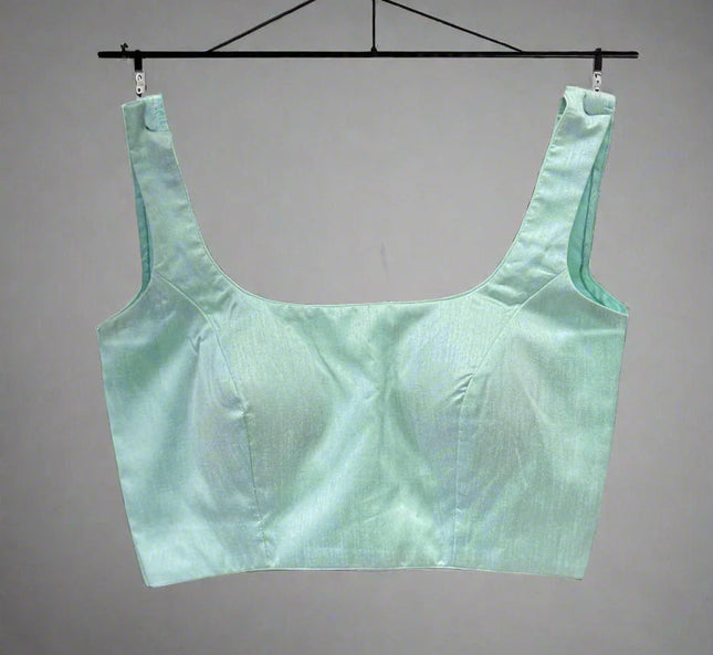 Sea green semi raw silk sleeveless blouse