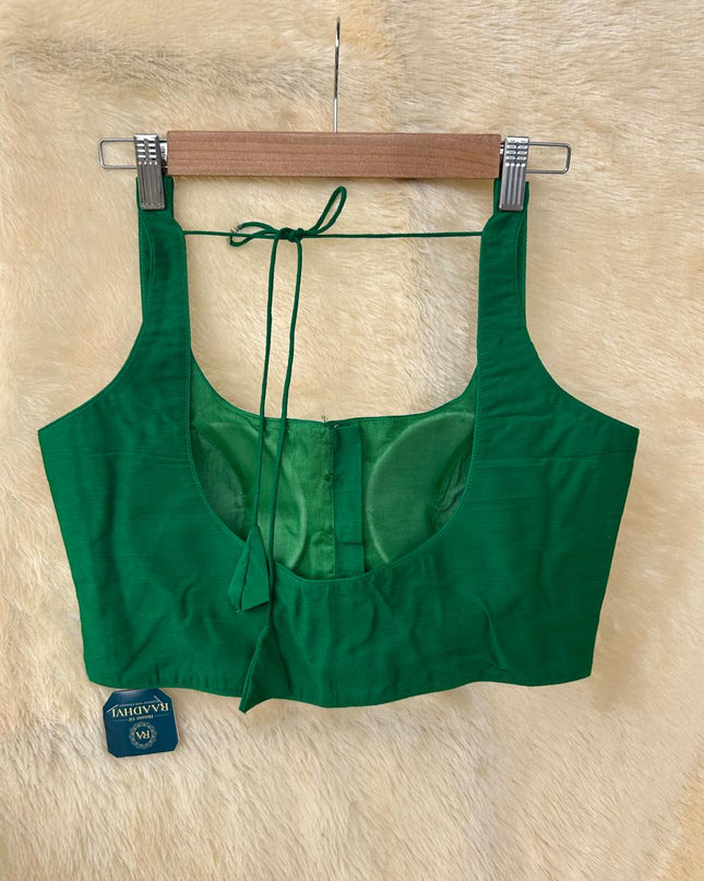 Green raw silk sleeveless blouse