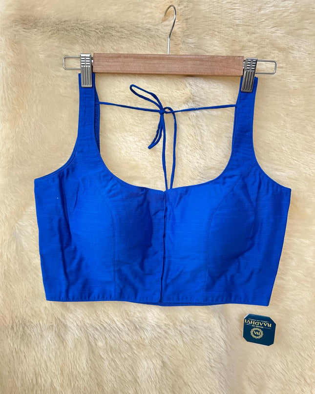 Blue raw silk sleeveless blouse