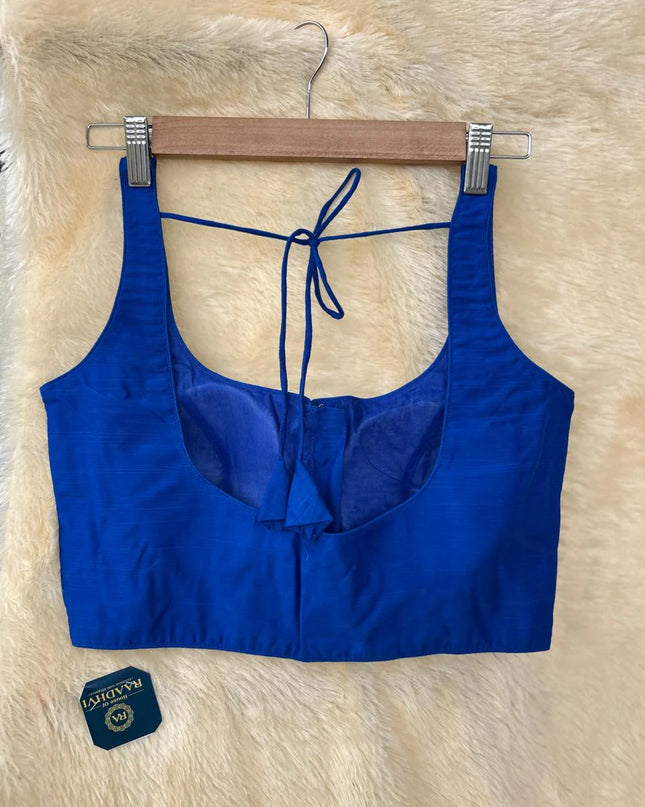 Blue raw silk sleeveless blouse