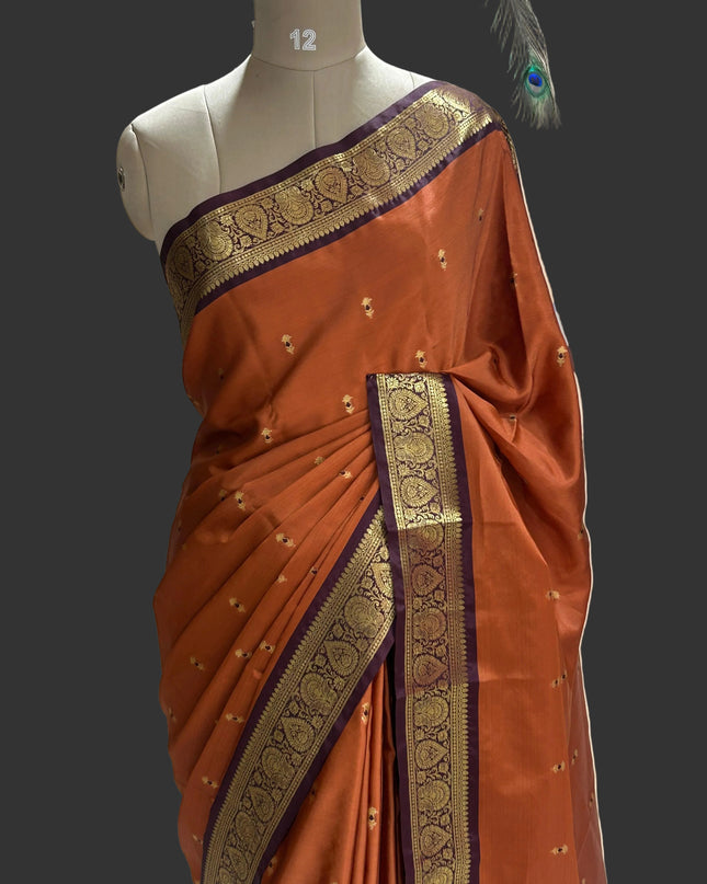 Rust orange small butta kanchi 104 silk saree