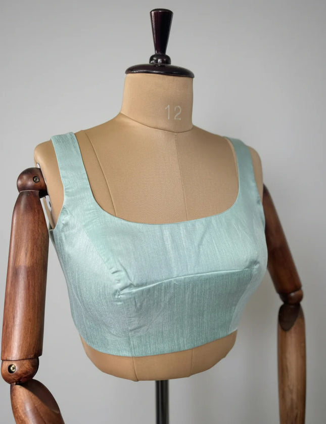 Sea green semi raw silk sleeveless blouse