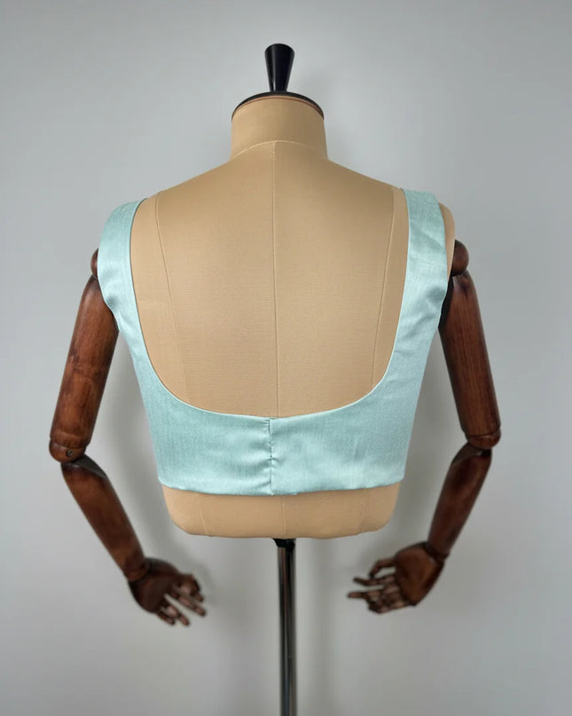 Sea green semi raw silk sleeveless blouse