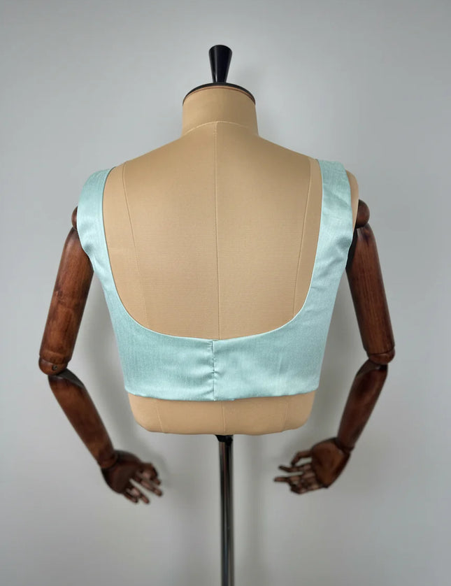 Sea green semi raw silk sleeveless blouse