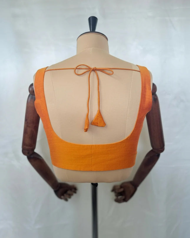 Orange raw silk sleeveless blouse