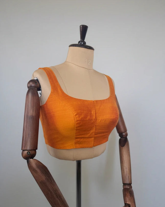 Orange raw silk sleeveless blouse