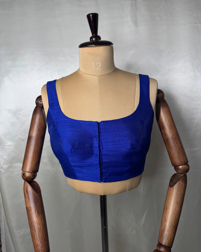 Blue raw silk sleeveless blouse