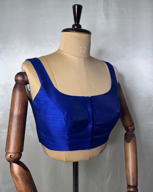 Blue raw silk sleeveless blouse