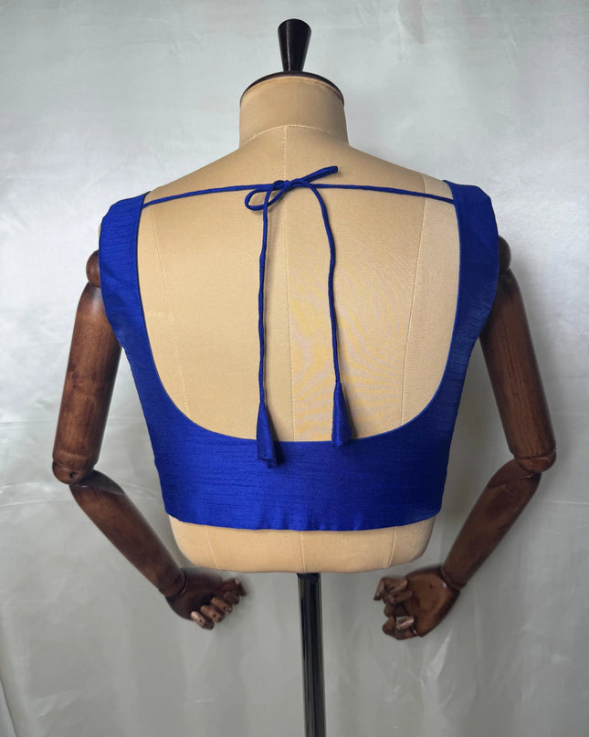 Blue raw silk sleeveless blouse