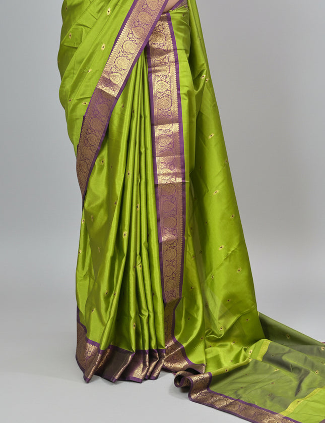 Parrot green small border kanchi 104 silk saree