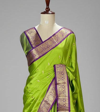 Parrot green small border kanchi 104 silk saree
